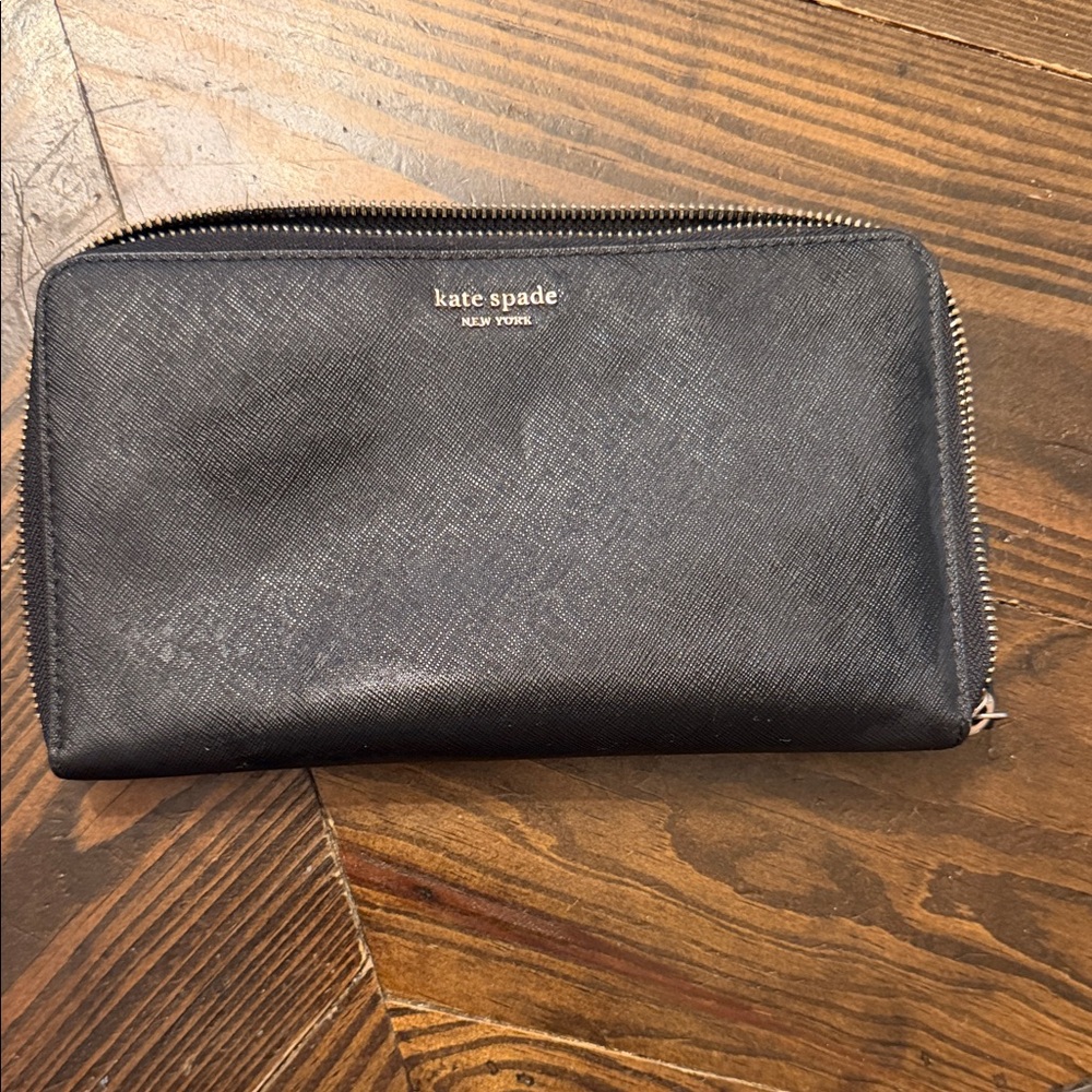kate spade large black saffiano zip-around wallet with gold logo